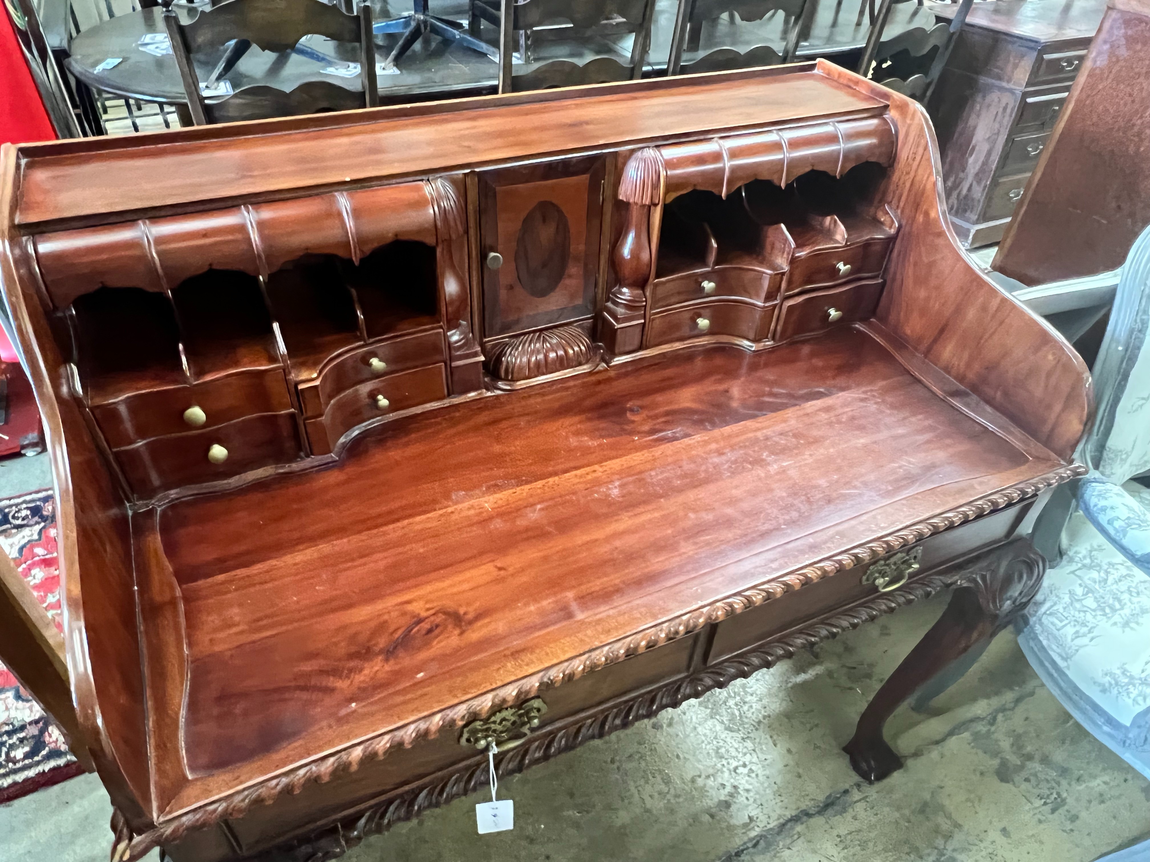 A reproduction George III style mahogany desk, width 103cm depth 60cm height 104cm